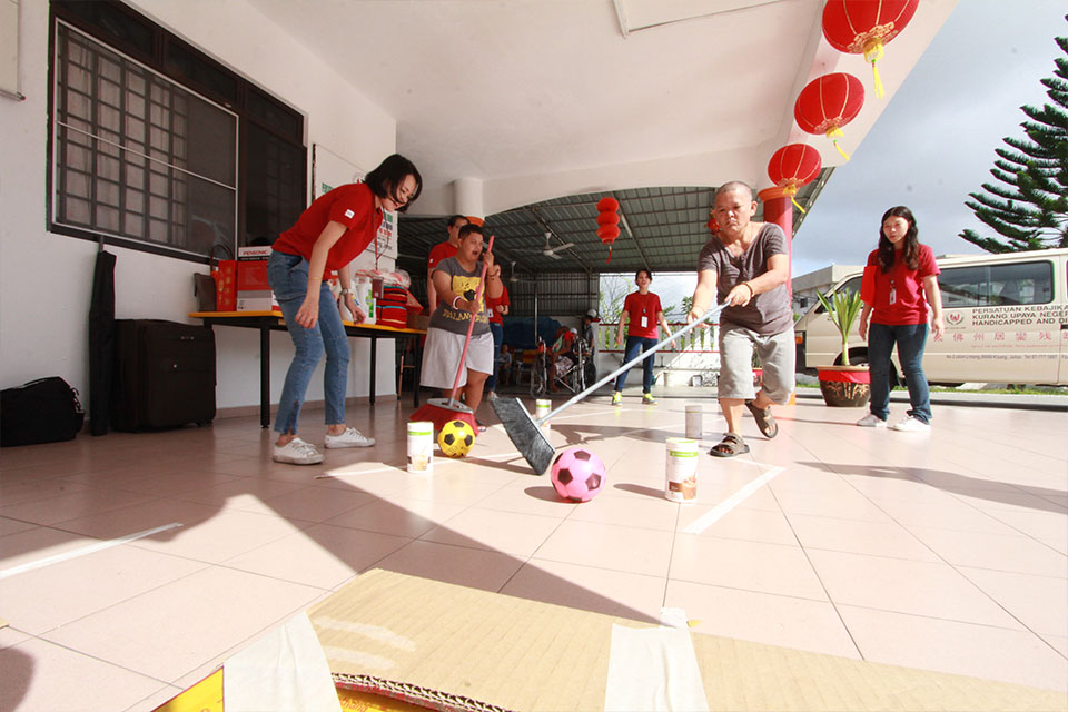 Team having games with the inmates